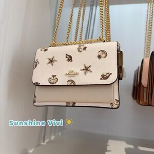 NWT Coach Mini Klare Crossbody Bag With Shell Print Gold/Chalk Multi CBI18